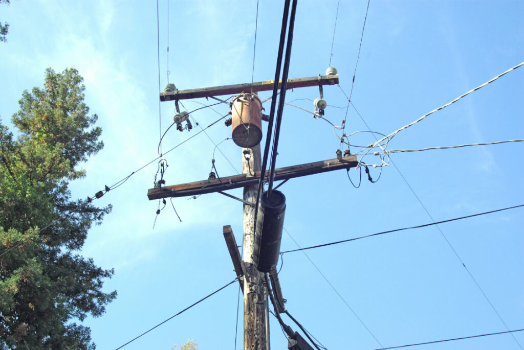 Photo of a  rusting PG&E transformer